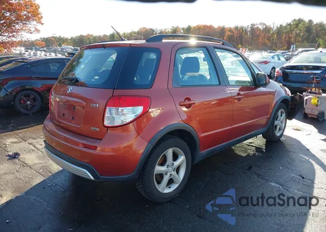 2009 Suzuki Sx4 Technology z USA, uszkodzony, nr VIN JS2YB413895100110